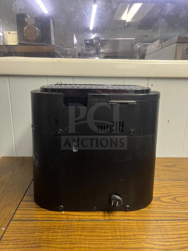 DeLonghi BCO430 combination espresso and drip coffee machine, silver and black, features frothing wand, excellent condition.