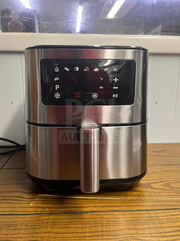 Insignia™ 5 Qt. Digital Air Fryer in stainless steel, touchscreen display, sleek design, model AIR FRYER, excellent condition.