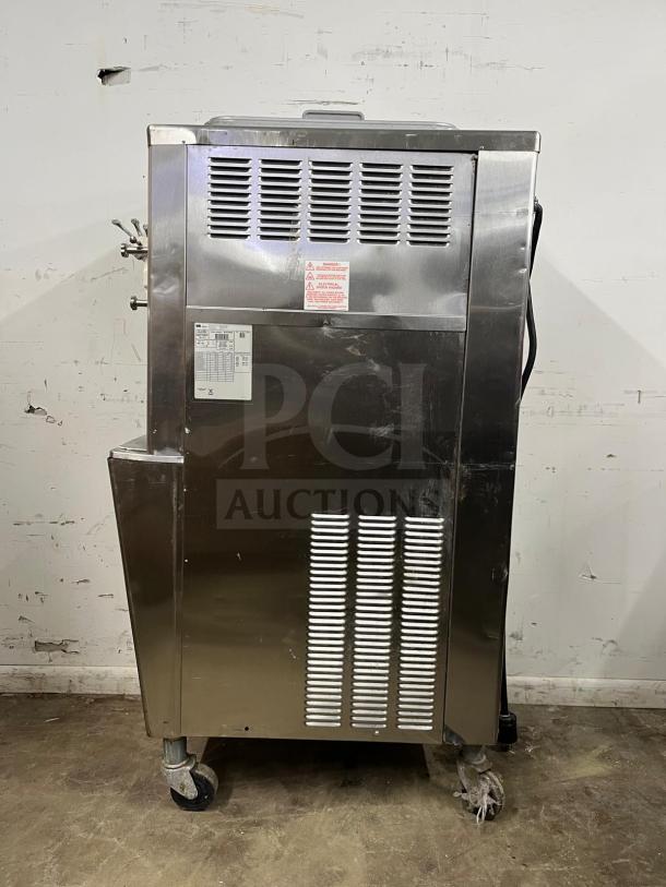 TAYLOR 794-33 Soft Serve Ice Cream Machine, stainless steel, used condition, visible model label and warning stickers.