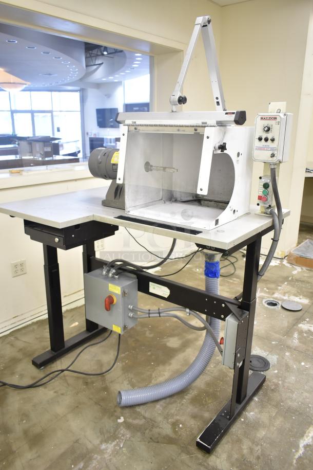 Baldor enclosed suction polishing machine with foot pedal. Operates at 208-230/460 volts, 3 phase.