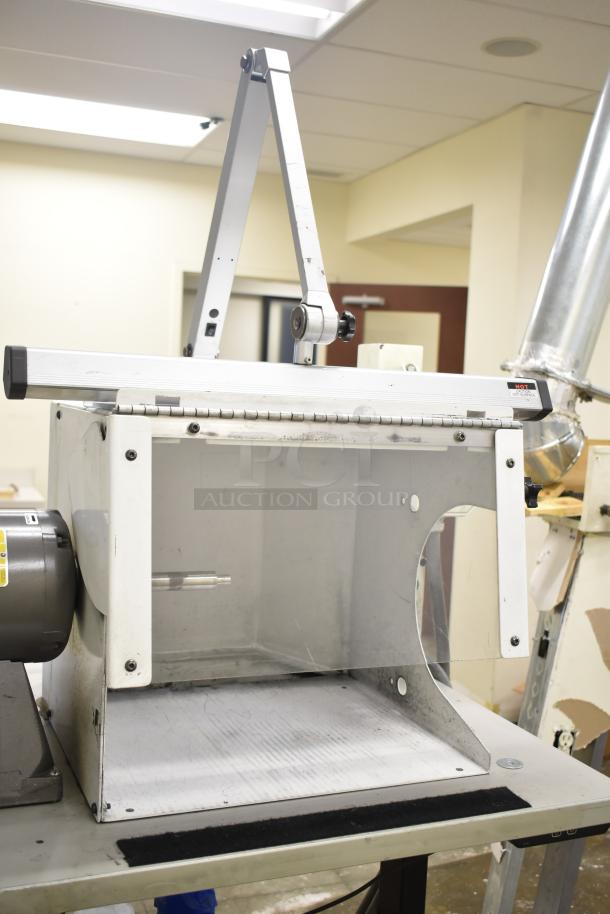 Baldor Enclosed Suction Polishing Machine with foot pedal, 208-230/460V, 3-phase. Features durable metal construction.