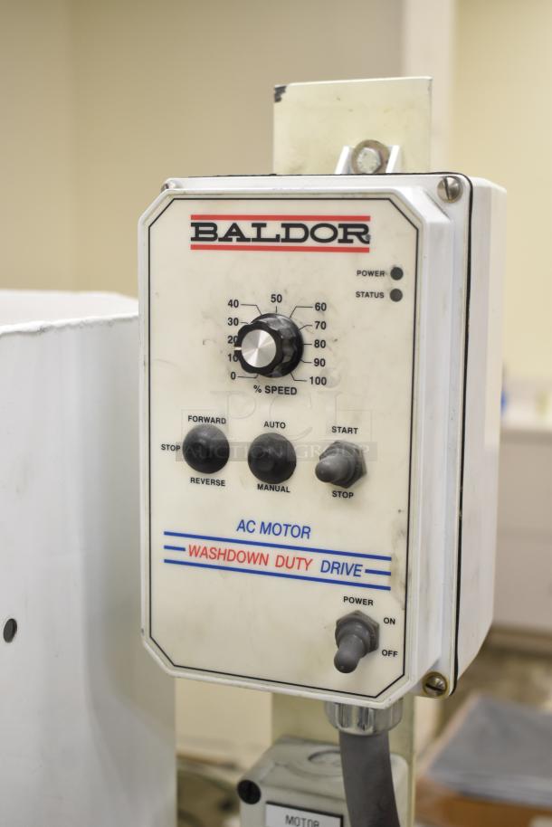 Baldor enclosed suction polishing machine with foot pedal, 208-230/460 volts, 3 phase. Control panel with speed and mode settings.