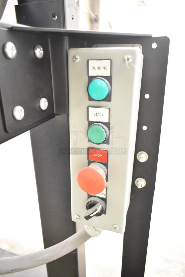 "Baldor enclosed suction polishing machine control panel with running, start, stop buttons, and foot pedal connector."