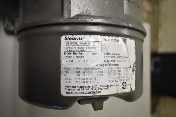 Baldor enclosed suction polishing machine with foot pedal; 208-230/460 volts, 3 phase; Stearns model 105601100BPF label visible.