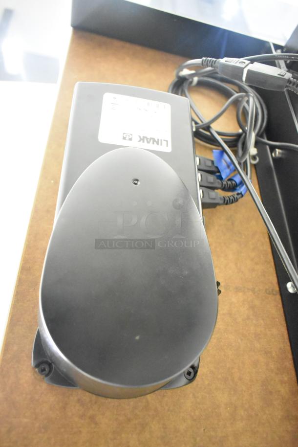 Baldor enclosed suction polishing machine with foot pedal, 208-230/460V, 3 phase. Shows power cords and labeling.