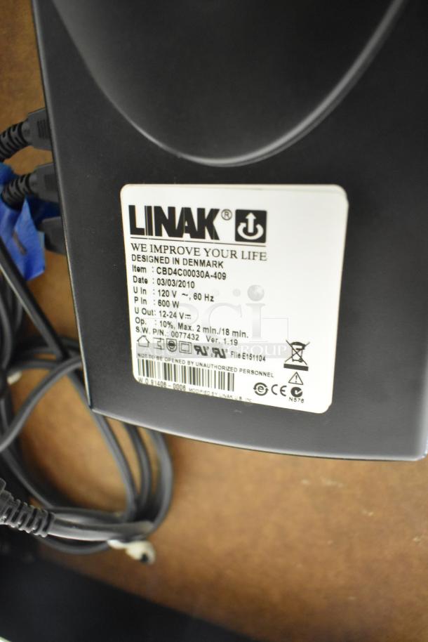 Baldor enclosed suction polishing machine with foot pedal, 208-230/460 volts, 3 phase, features Linak motor label details.