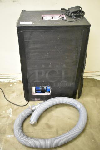 Quatro Air Technologies PGR-21 dust collector, 100-120V, 1 Phase. Includes flexible hose, control panel visible, used condition.