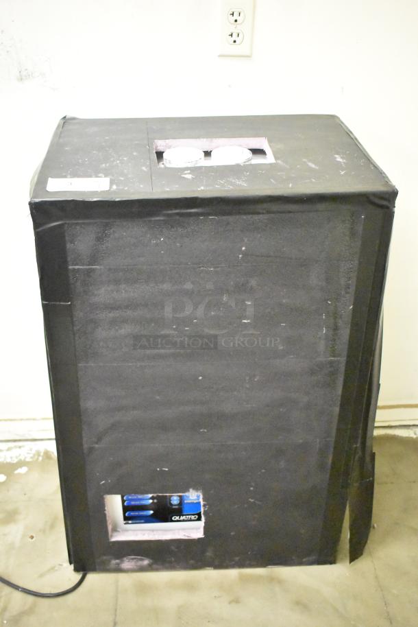 Quatro Air Technologies PGR-21 dust collector, black, 100-120V, 1 phase. Label showing controls and brand name visible.