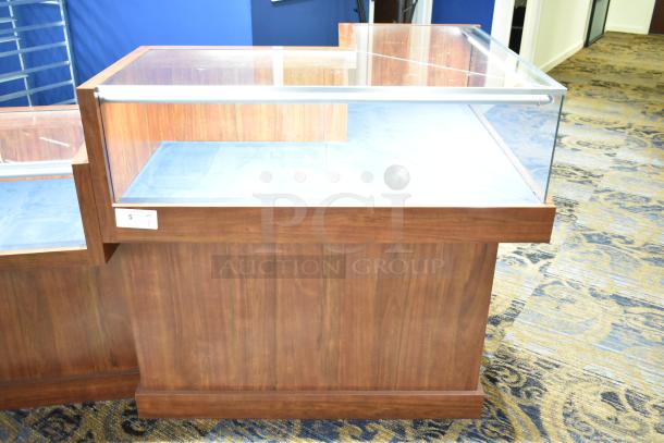 Wooden corner style jewelry display case with glass top. Excellent condition. Display tag reads "5 QTY."