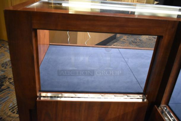 Wooden corner style jewelry display case with glass top, rich wood finish, blue interior lining, excellent condition.