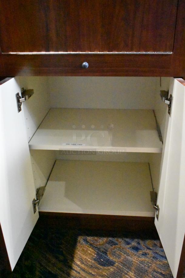 Wooden corner jewelry display case, open cabinet doors, shelves inside. Brown exterior, white interior. Sturdy hinges.