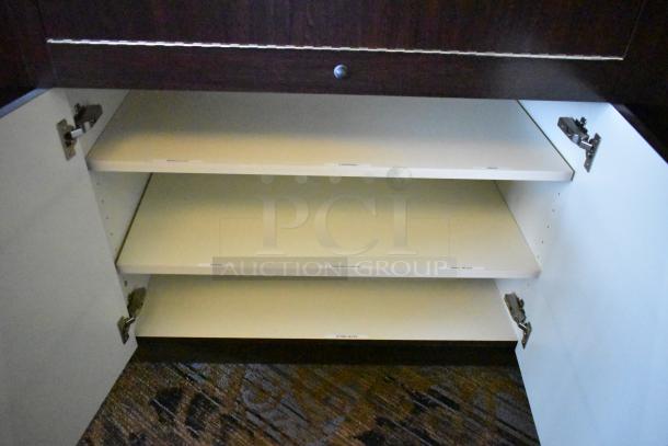 Wooden jewelry merchandising display case with open shelves, labeled sections, and metal hinges. Ideal for organized storage.