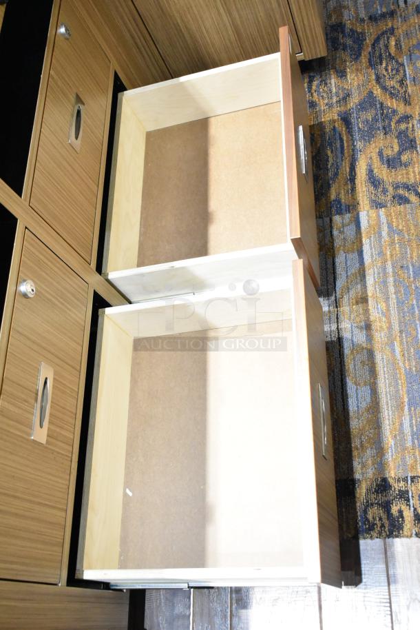 Wooden corner-style jewelry display case with open drawers, metal handles, and wood veneer finish. Good condition.