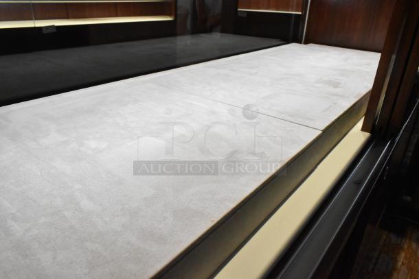 Wooden corner jewelry display case, features two rear sliding doors, and a spacious display area, in good condition.