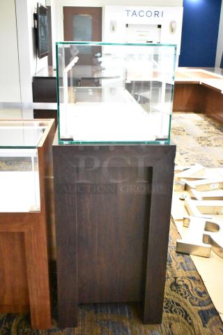 Wooden corner-style jewelry display case, glass top, no key, rich wood finish, suitable for retail settings.