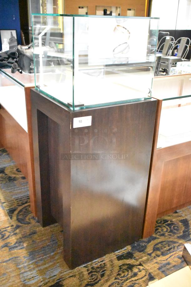 Wooden corner-style jewelry display case with glass top, no key, dark finish, labeled "10," in good condition.