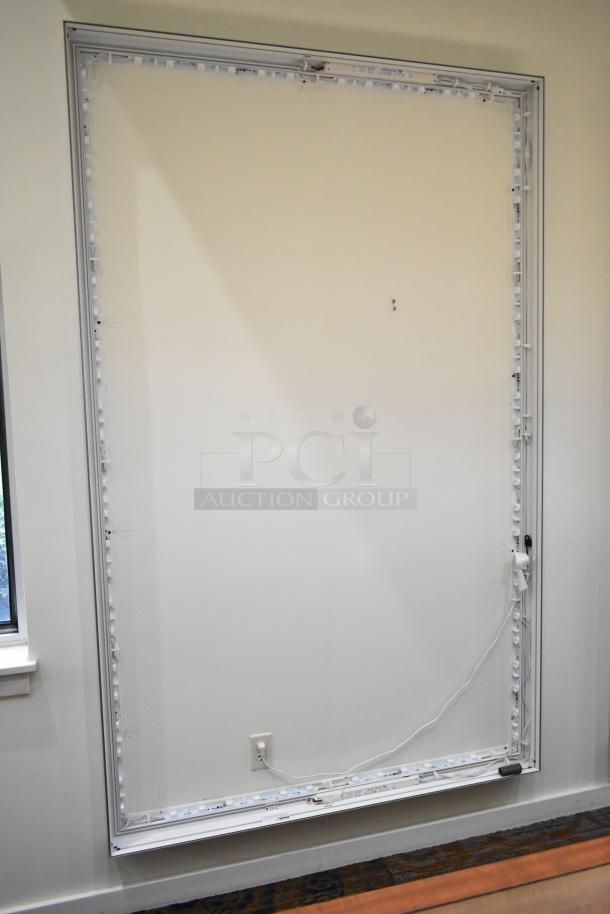 SEG Systems wall mount lighted picture frame, 110-277V, aluminum frame, integrated lighting, excellent condition.