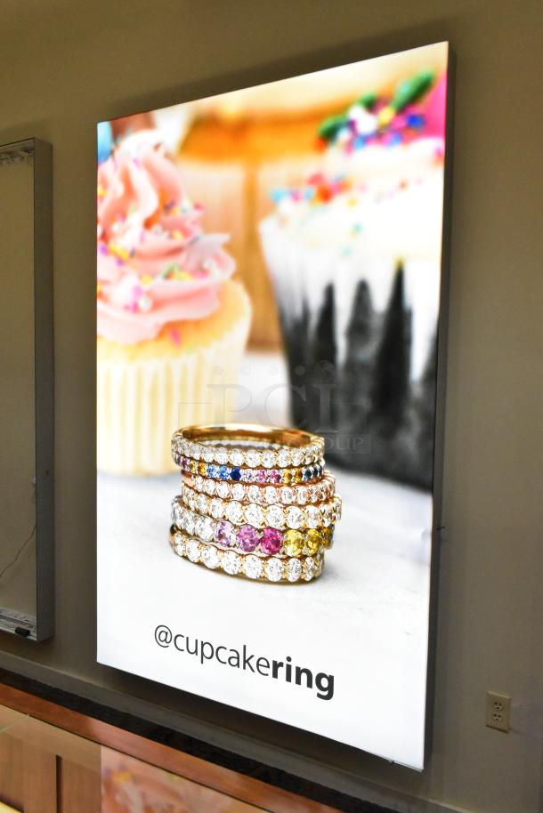 SEG Systems LB-EDG-6D-W6-24 wall mount lighted picture frame, 110-277 volts, featuring cupcake and rings image.