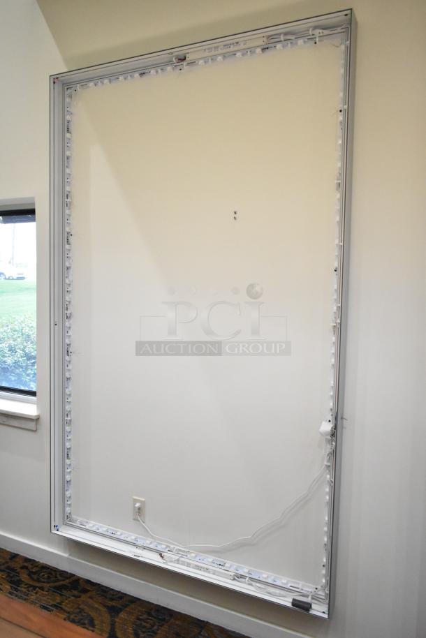 SEG Systems LB-EDG-6D-W6-24 wall mount lighted picture frame, 110-277 volts, silver frame, LED lights around edges.