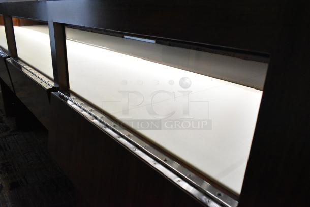 Lighted wooden jewelry display case with two drawers, features illuminated interior, excellent for showcasing fine jewelry.