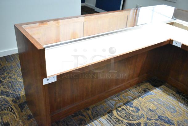 Wooden lighted jewelry case with two rear doors. Excellent condition, buyer must remove. Bring tools and manpower.