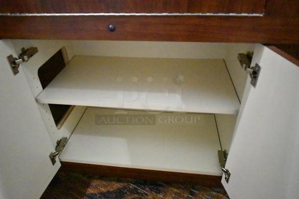 Lighted wooden jewelry display case with 6 rear doors and 3 drawers; open cabinet interior shown, needs removal.