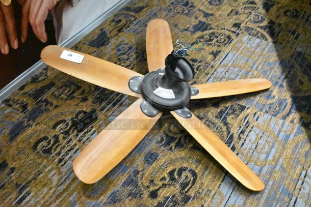 48-ATR ceiling mount fan with 5 wooden blades, black metal fixture, 120V, 1 phase. Slight wear, auction tag marked "29".