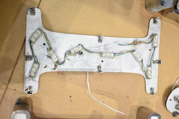 White I-shaped letter with silver finish frame, featuring visible wiring and mounting brackets, in used condition.