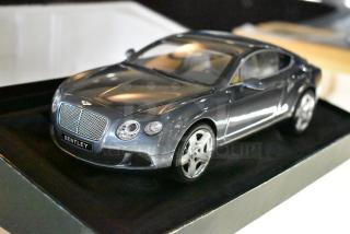 Bentley Continental GT gray Minichamp model in original box; intricate details, pristine condition, collectible item.