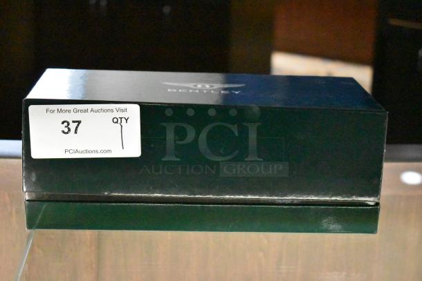 Bentley Continental GT Minichamp model car, original box, gray, item number 37 visible on auction label.