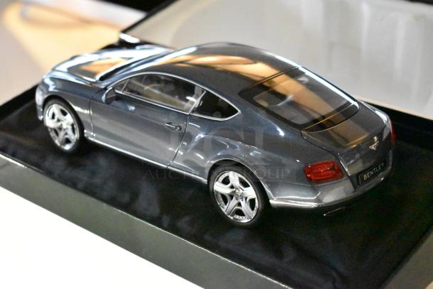 Minichamp Bentley Continental GT model car, gray, pristine condition, in original packaging.