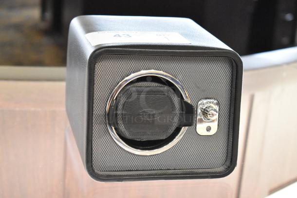 Wolf Windsor M2.5 Single Winder model 4524029, black finish, textured surface, chrome details, tag number 43.