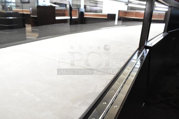 Wooden lighted jewelry case with 3 rear doors, 3 drawers. Requires removal tools and manpower.