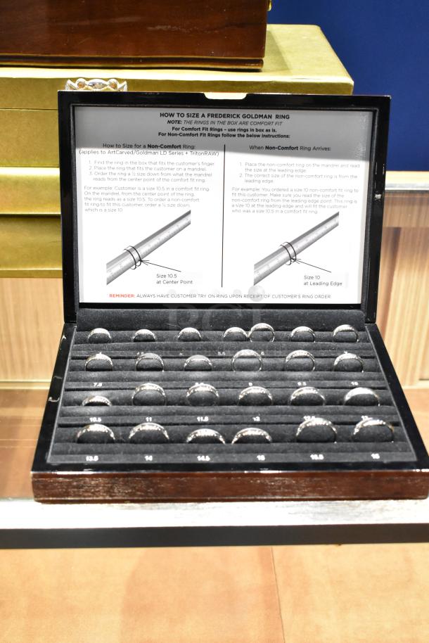 Frederick Goldman ring sizing kit in Art Carved case, featuring sizes 4 to 16 including half sizes, displayed in excellent condition.
