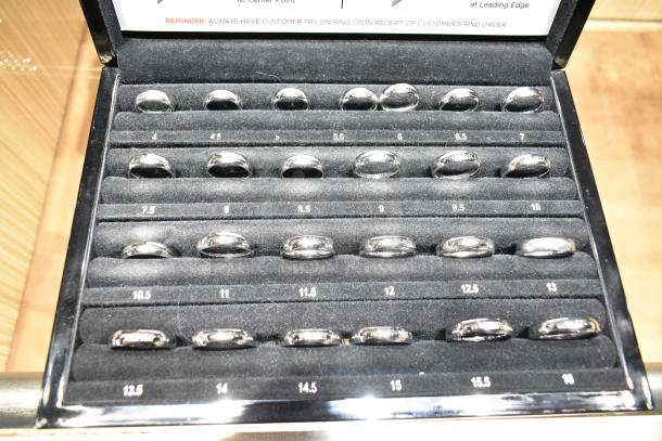 Frederick Goldman Ring Sizing Kit in Art Carved Case; sizes 4 to 16, including half sizes. Rings displayed in a lined case.
