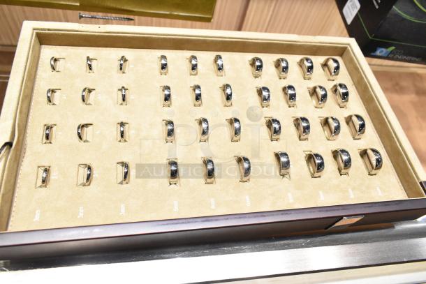 Ring sizing kit with Art Carved case, sizes 3.5 to 16 including half sizes, neatly displayed in a beige tray.