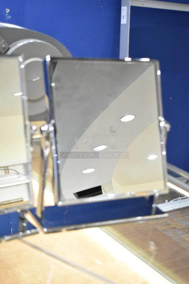 Three countertop mirrors, square shape, metal frames, adjustable angle, excellent condition, modern design.