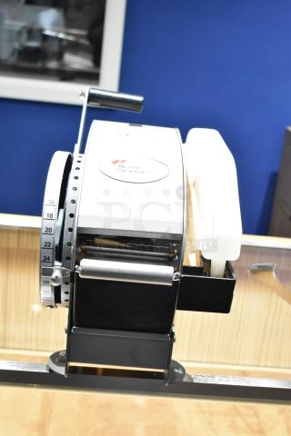 Better Packages 333 Plus Manual Kraft Tape Dispenser, excellent condition, features a cutting lever, visible brand logo.