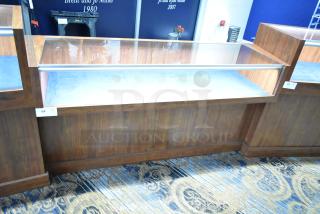 Wooden lighted jewelry case with glass display, excellent condition. Buyer must remove with tools and manpower.