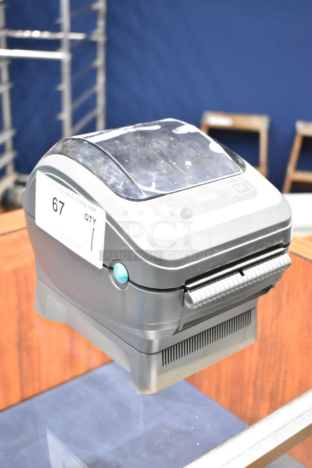 Zebra ZP 450 Label Thermal Printer, good condition, model ZP 450, features a visible auction tag with quantity details.