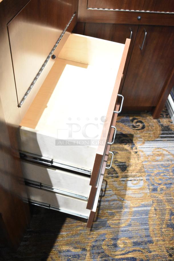 Wooden corner lighted jewelry case with 2 rear doors, 3 drawers. Features sleek metal handles, needs removal tools.