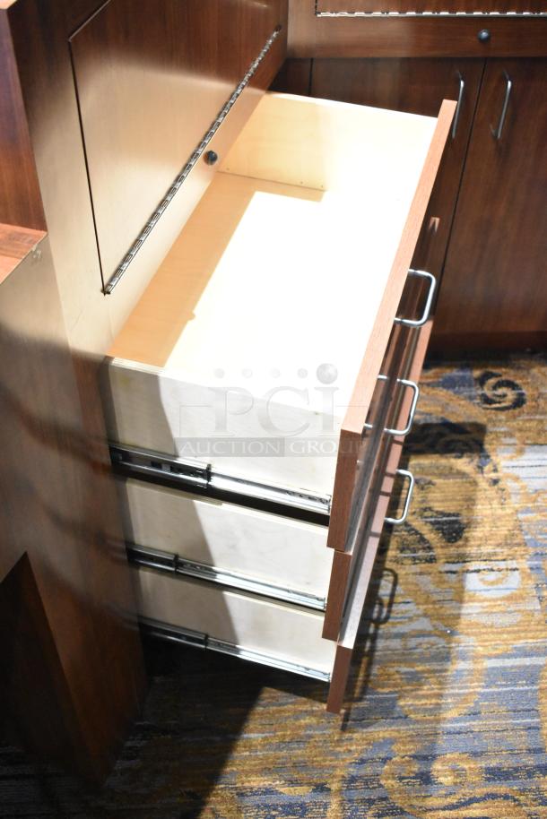 Wooden corner style lighted jewelry case with two rear doors, three drawers, metal handles, and light interior.