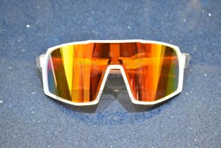 Brand new white framed sunglasses with vibrant orange lenses, perfect condition.