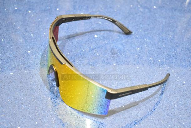 Brand new gray framed sunglasses with orange lens, featuring a sleek design and pristine condition.