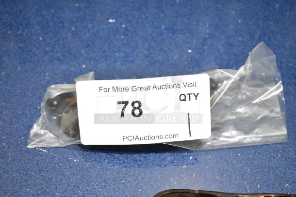 Brand new brown framed sunglasses with BluBlocker brown lenses in plastic packaging, marked with auction tag "78."