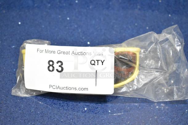 Brand new Viper sunglasses with yellow frame and red lens in packaging, auction tag number 83 visible.