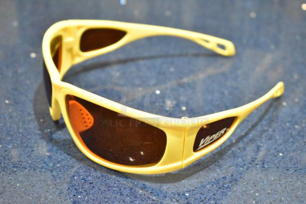 BRAND NEW Viper yellow framed sunglasses with red lenses, featuring logo on the side, in pristine condition.