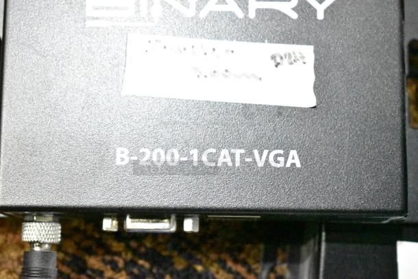 Binary B-200-1CAT-VGA transmitter with label, part of auction including three transmitters and Netgear GS105 switch.