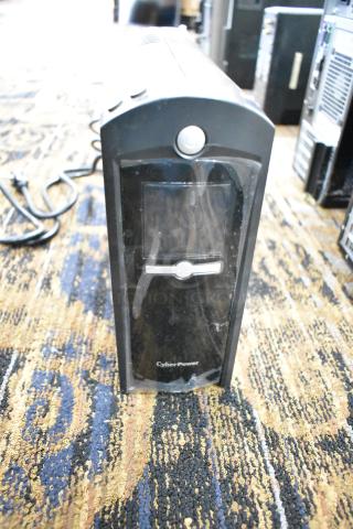 CyberPower 1350VA Intelligent LCD UPS, 125V, 1 Phase; features front display and power button. Appears in used condition.