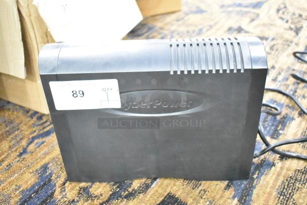 CyberPower 1350VA Intelligent LCD UPS, black, 125V, visible label “89 QTY 1”, vented top, good condition.